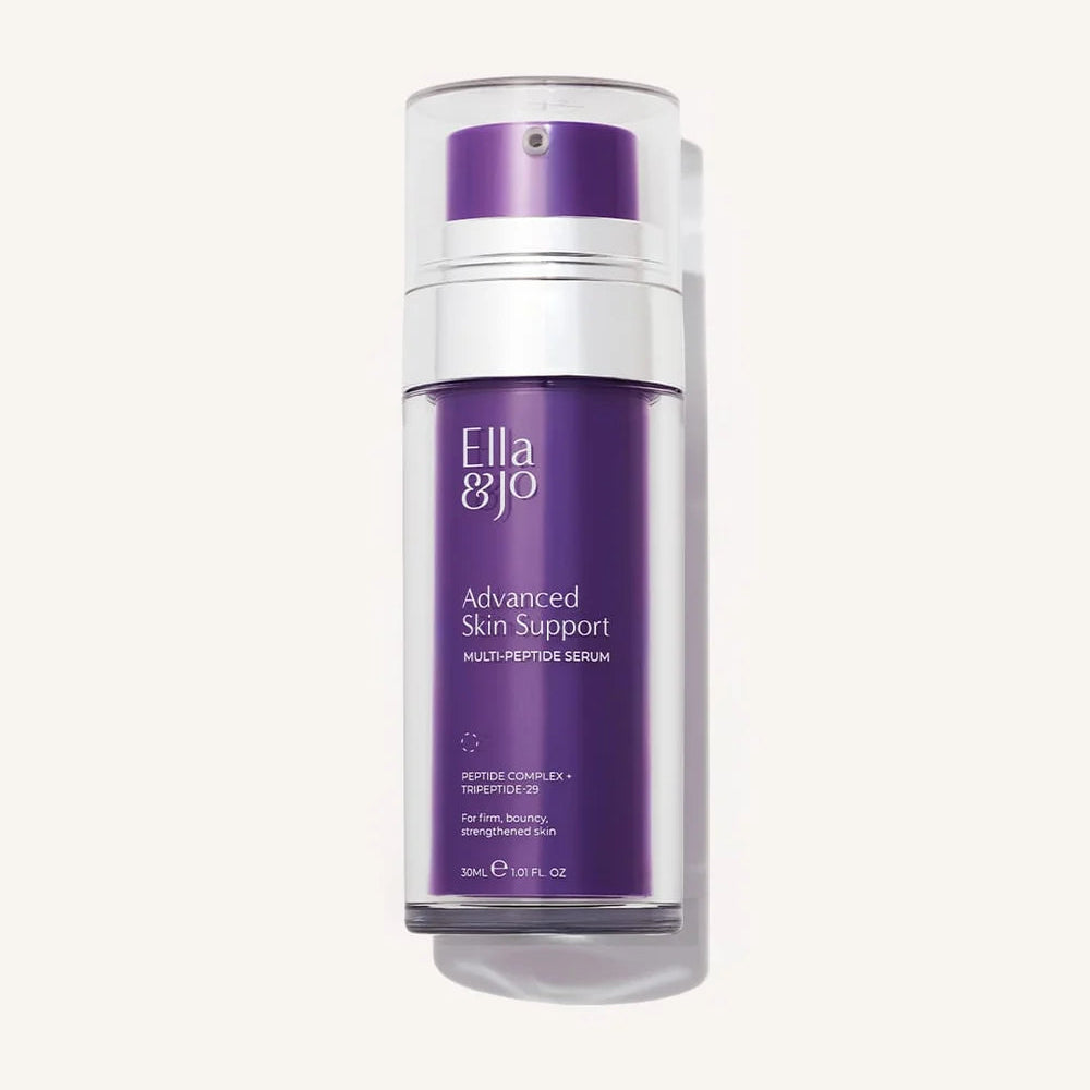 Ella G&J O Advanced Skin Support Multi-Peptide Serum in a clear bottle with a metallic purple pump dispenser, set against a solid off-white background.