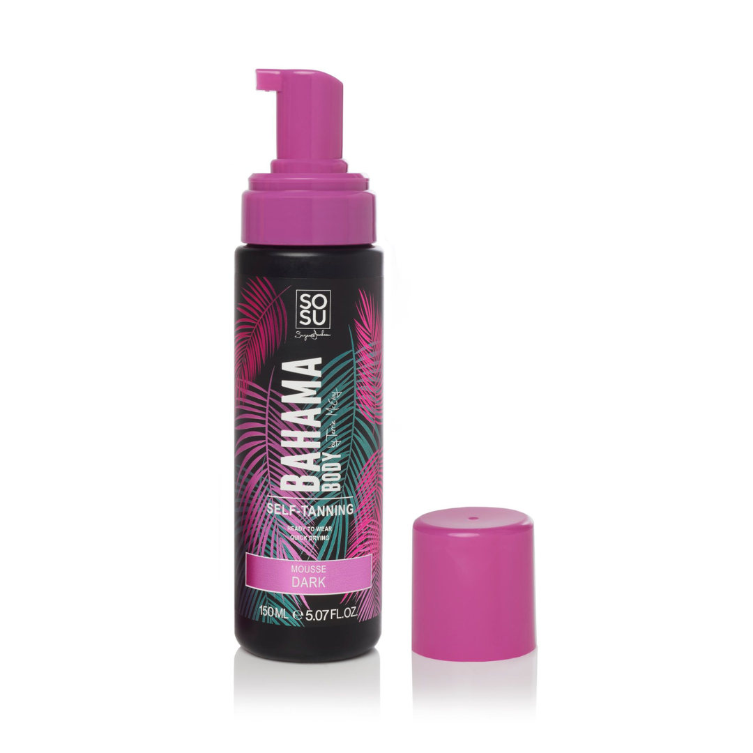 A pump bottle of Bahama Body self-tanning mousse in Dark shade, with a tropical design and pink cap.